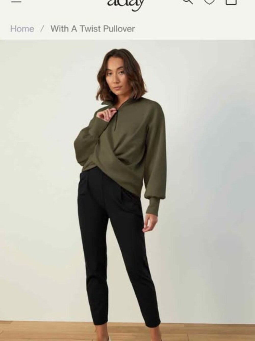 Aday with a twist pull over. Black Women's size Large